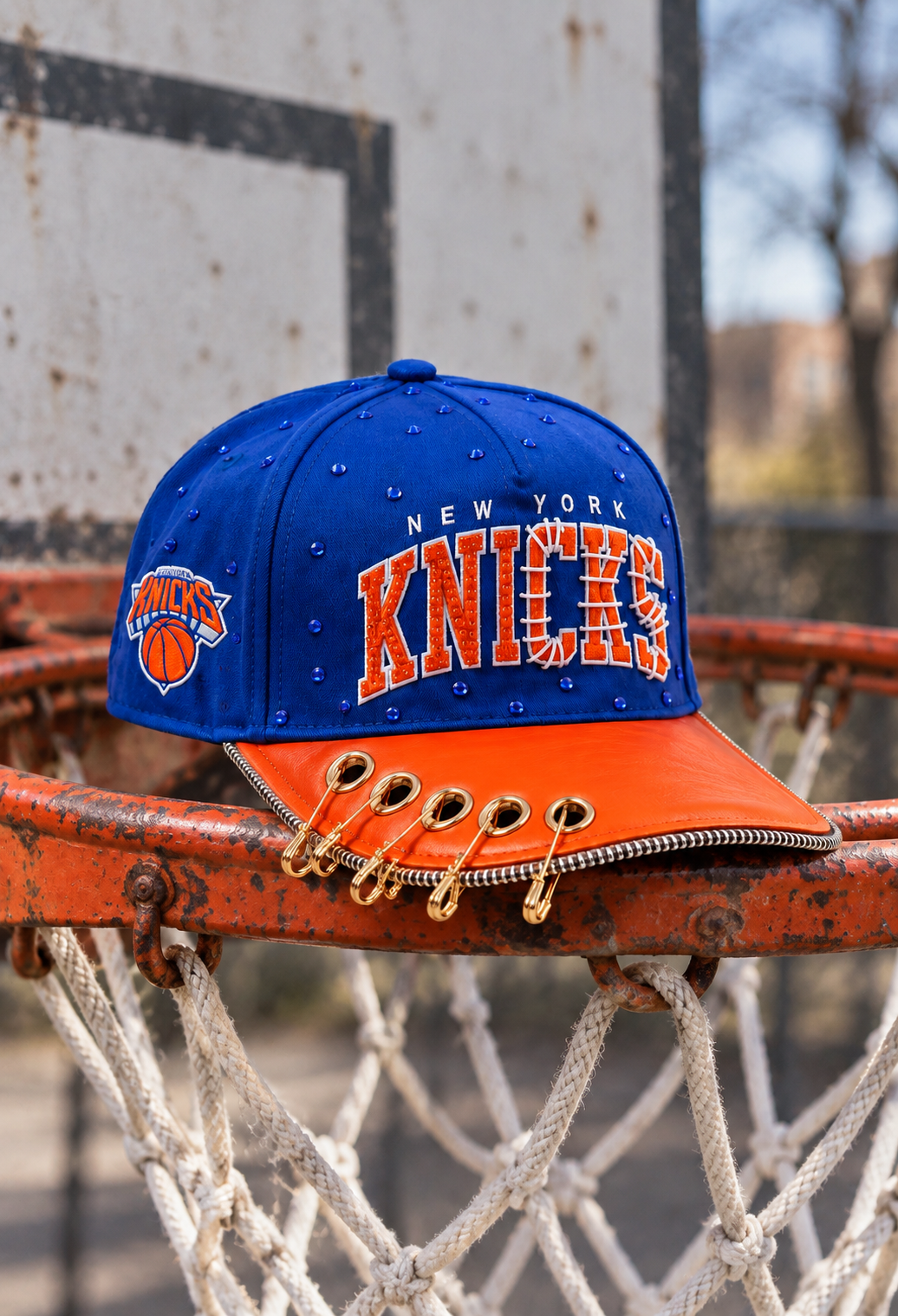 Hands lacing cord across the crown of a cap at the LuxeBrim bench